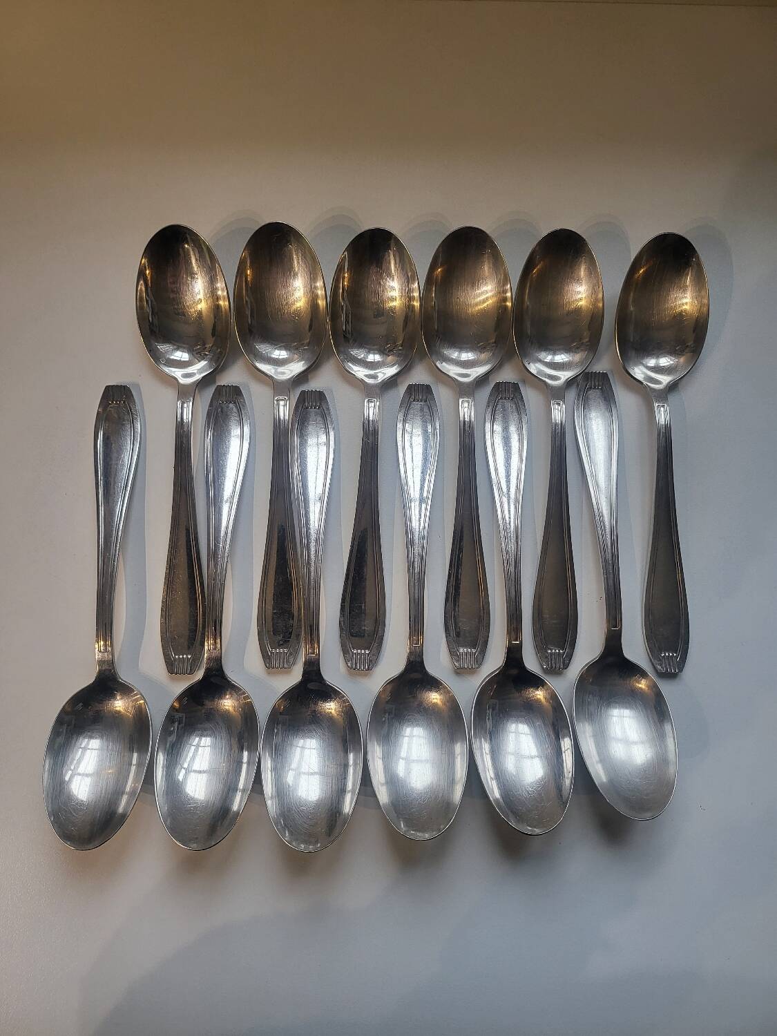 12 manufrance white metal table spoons