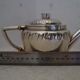 Teapot and milk jug English silverware