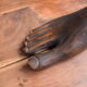 Carved wooden Buddha's foot