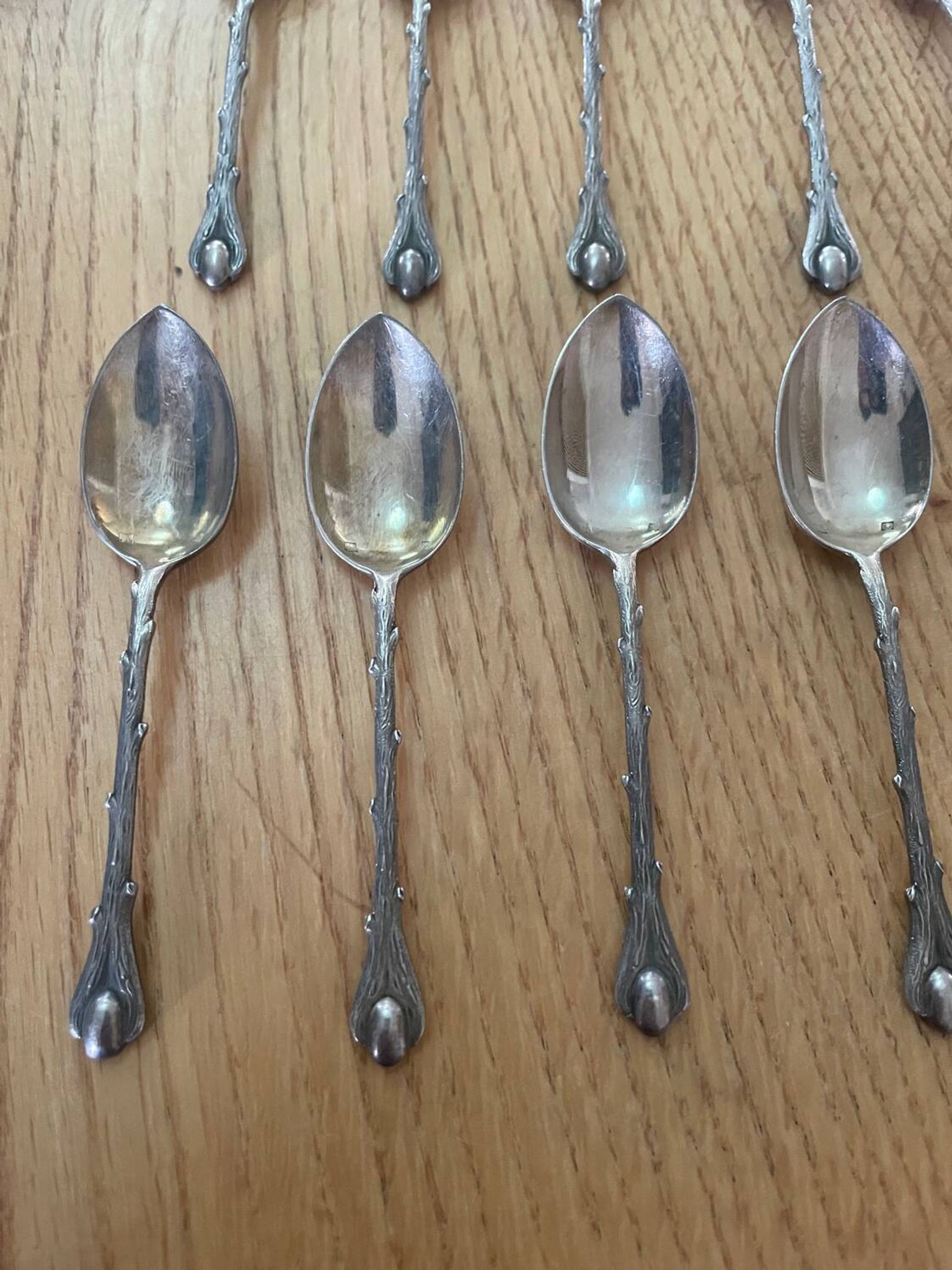 12 cuillères à moka en métal argenté