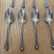 12 cuillères à moka en métal argenté