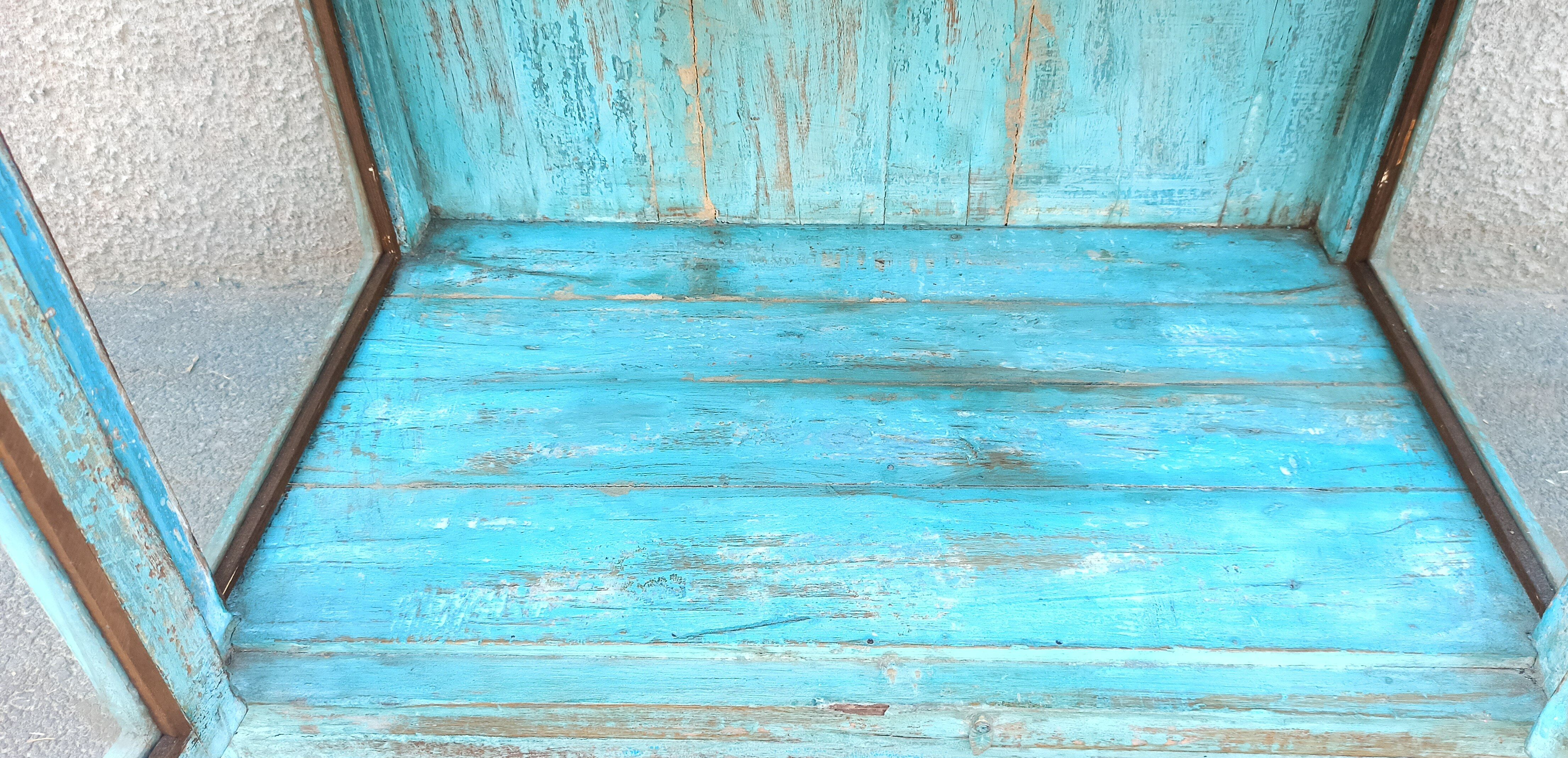 Blue wooden showcase
