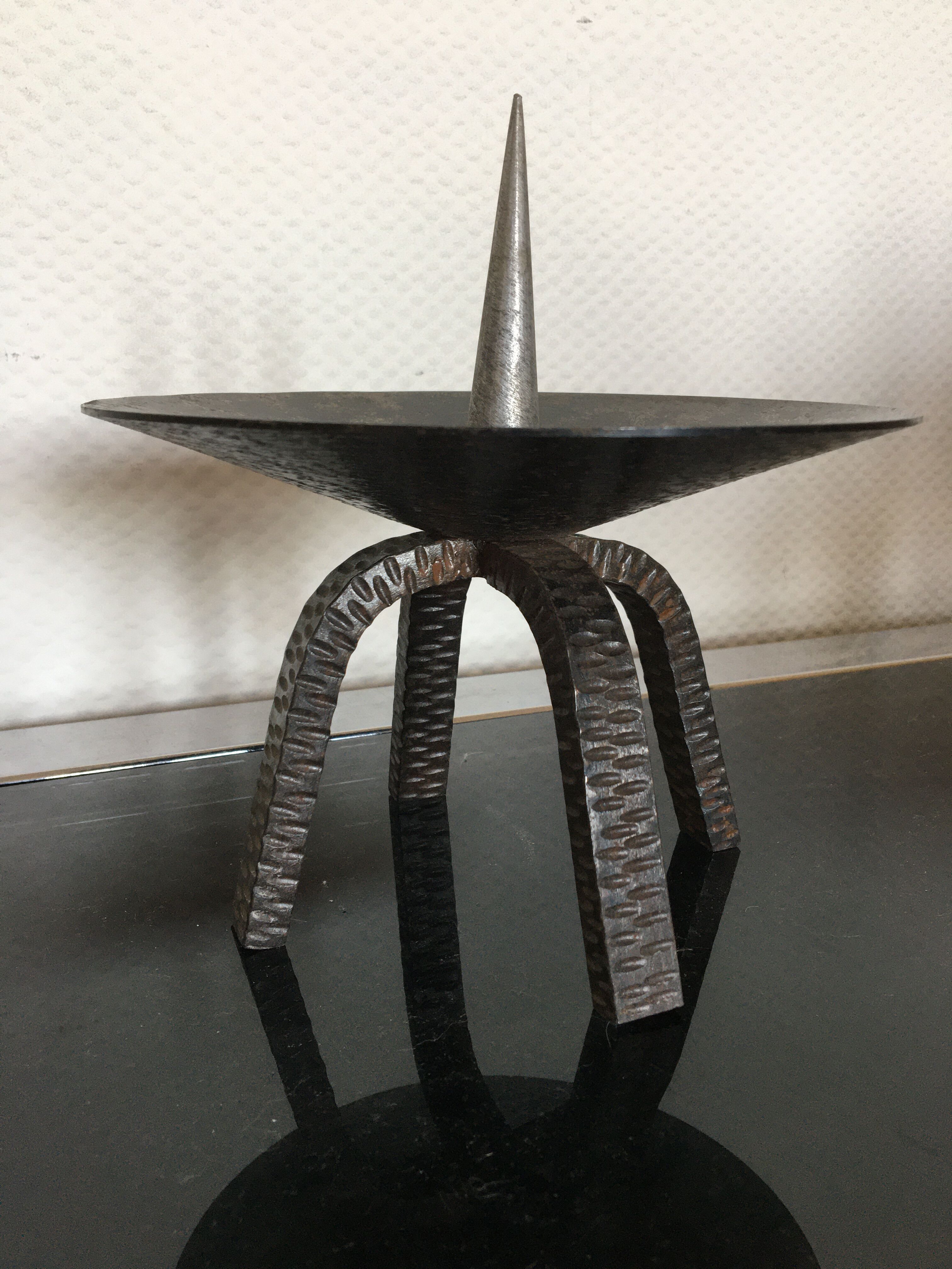 Pique wrought iron candle