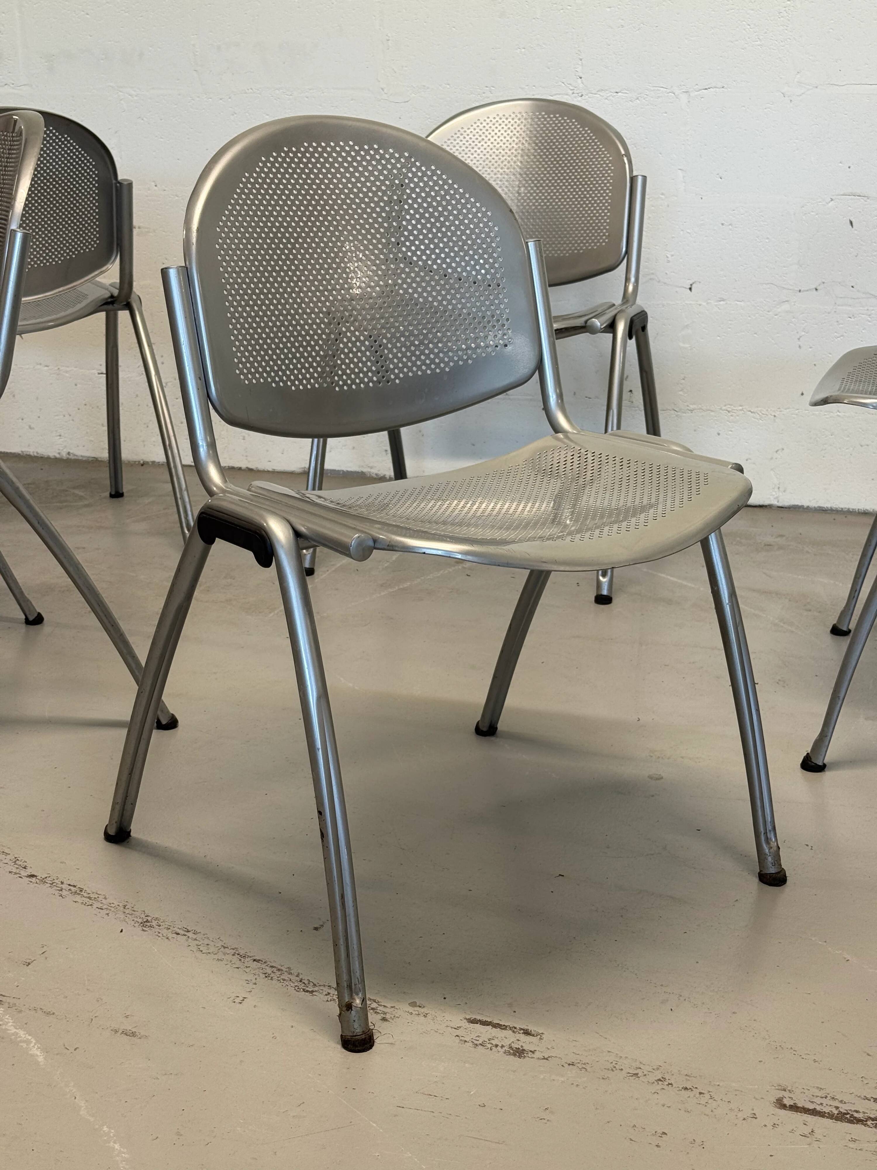 Vintage Sokoa stackable chairs, brutalist perforated metal chairs.