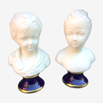 Children's busts in biscuit