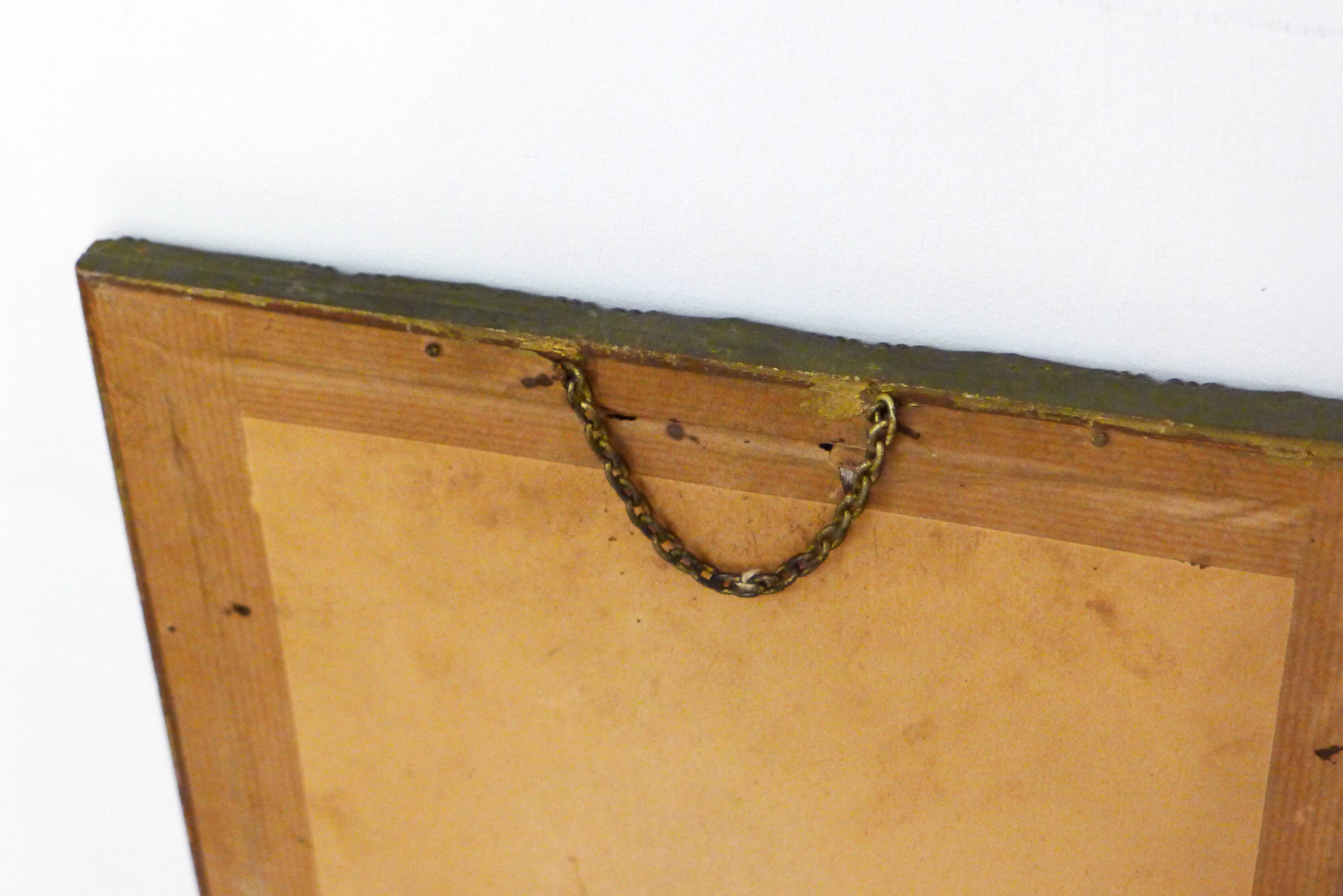 Large elongated gilded mirror