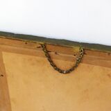 Large elongated gilded mirror