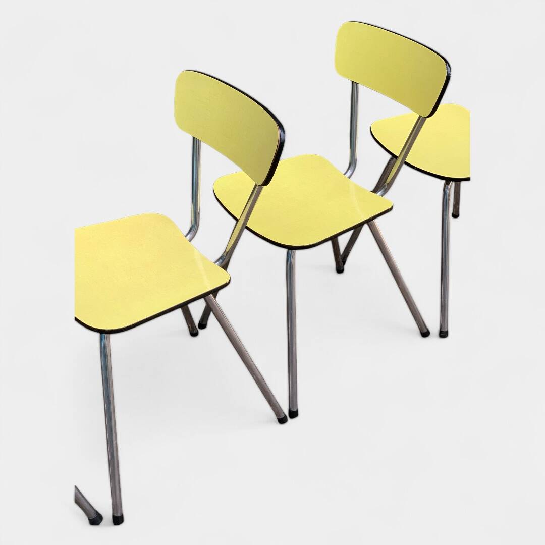 Yellow Formica chairs with compass legs, 1950s