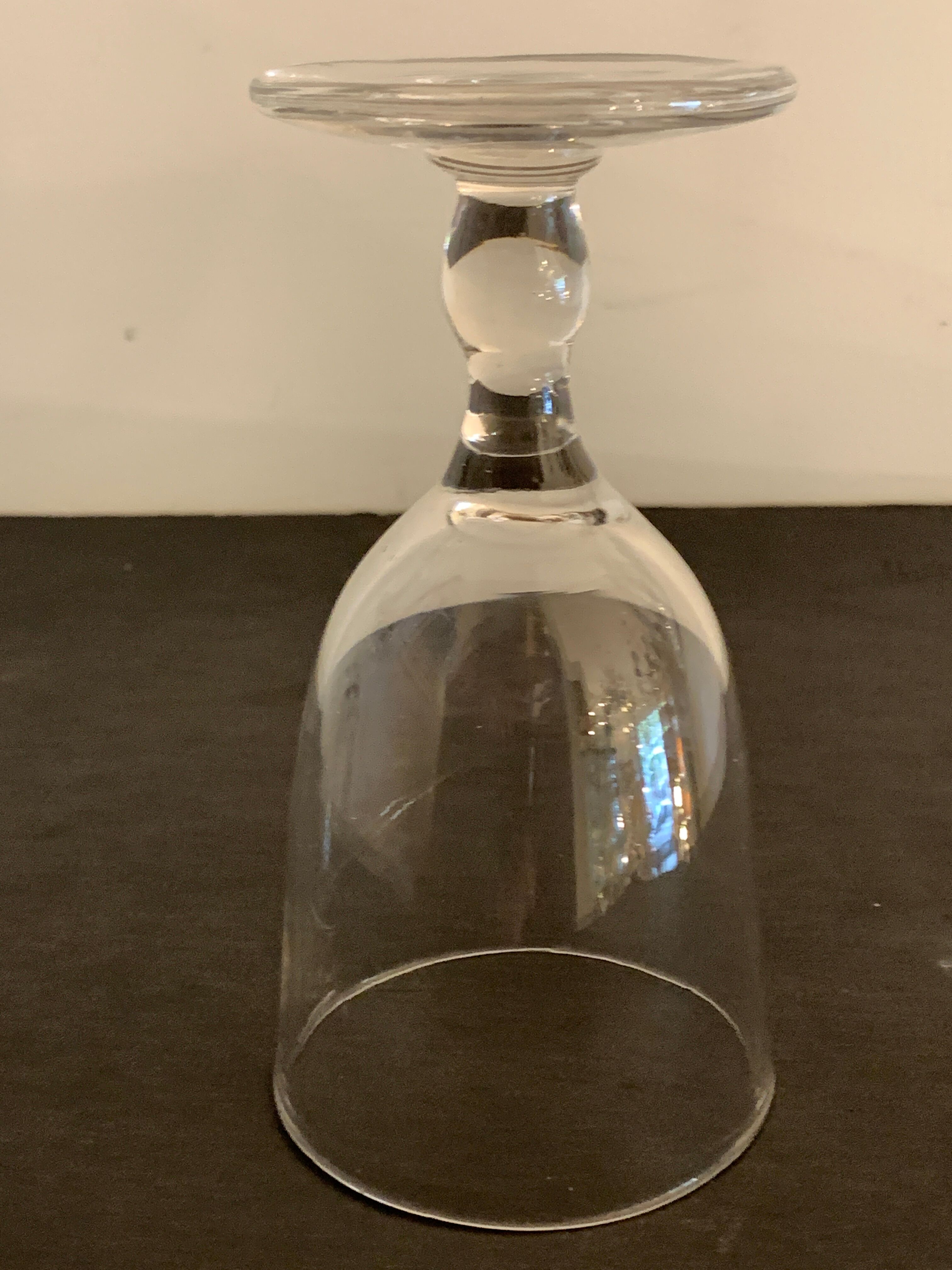7 antique blown foot glasses