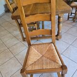 Dining table in solid oak with chairs.