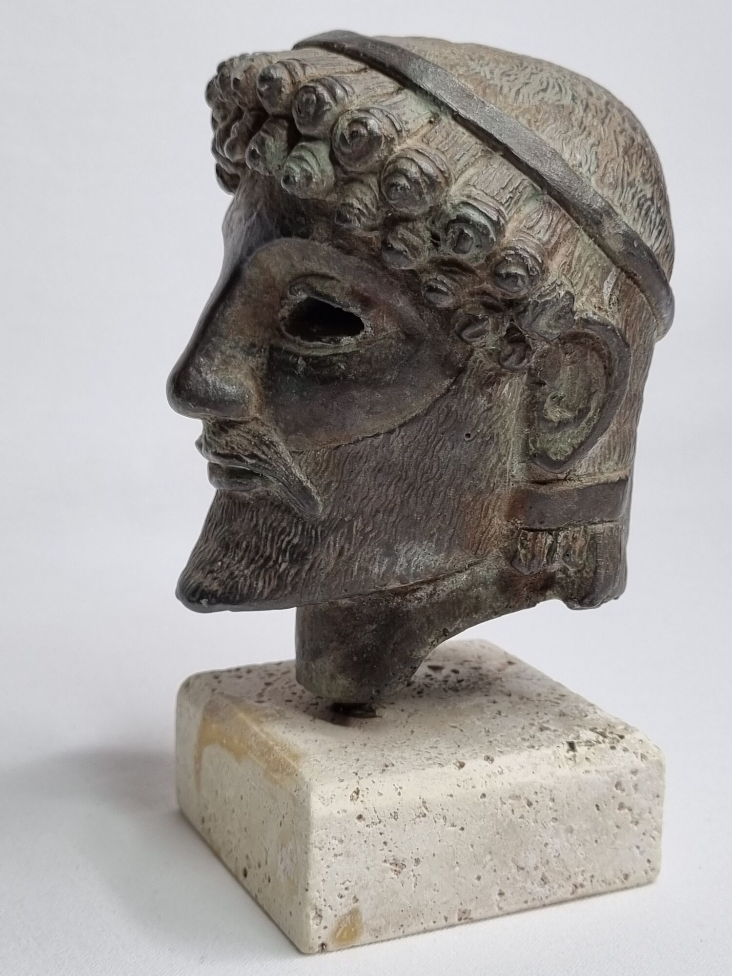 Head of Zeus in patinated plaster in imitation of bronze, 15 cm