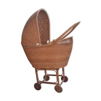 Vintage rattan doll's cradle