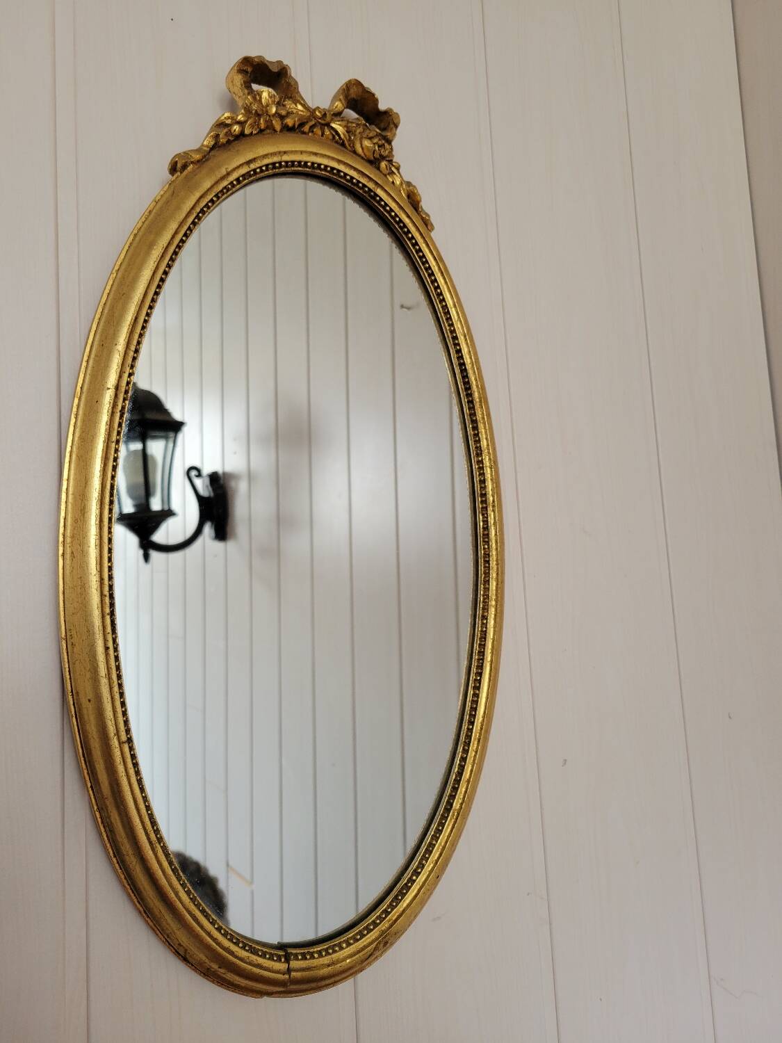 Louis XVI style oval mirror