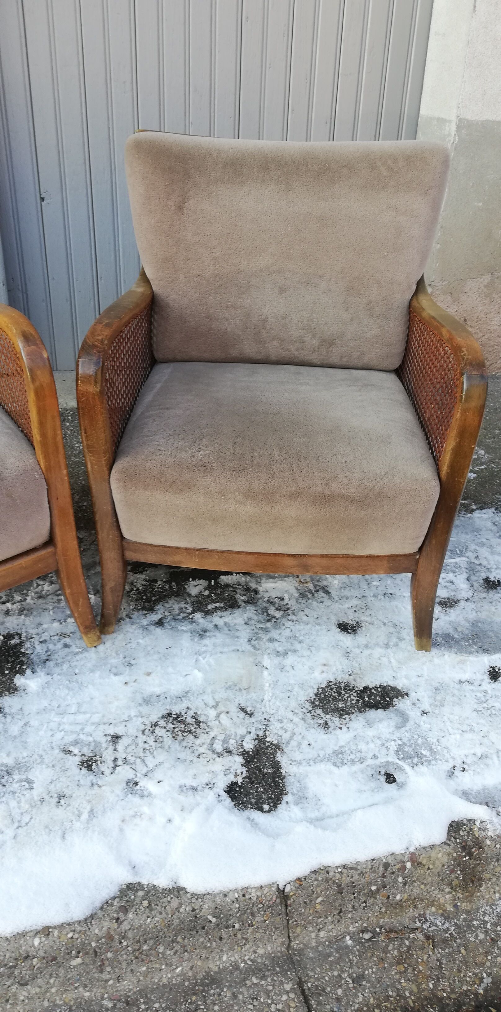 Pair of vintage cannage and fabric armchairs