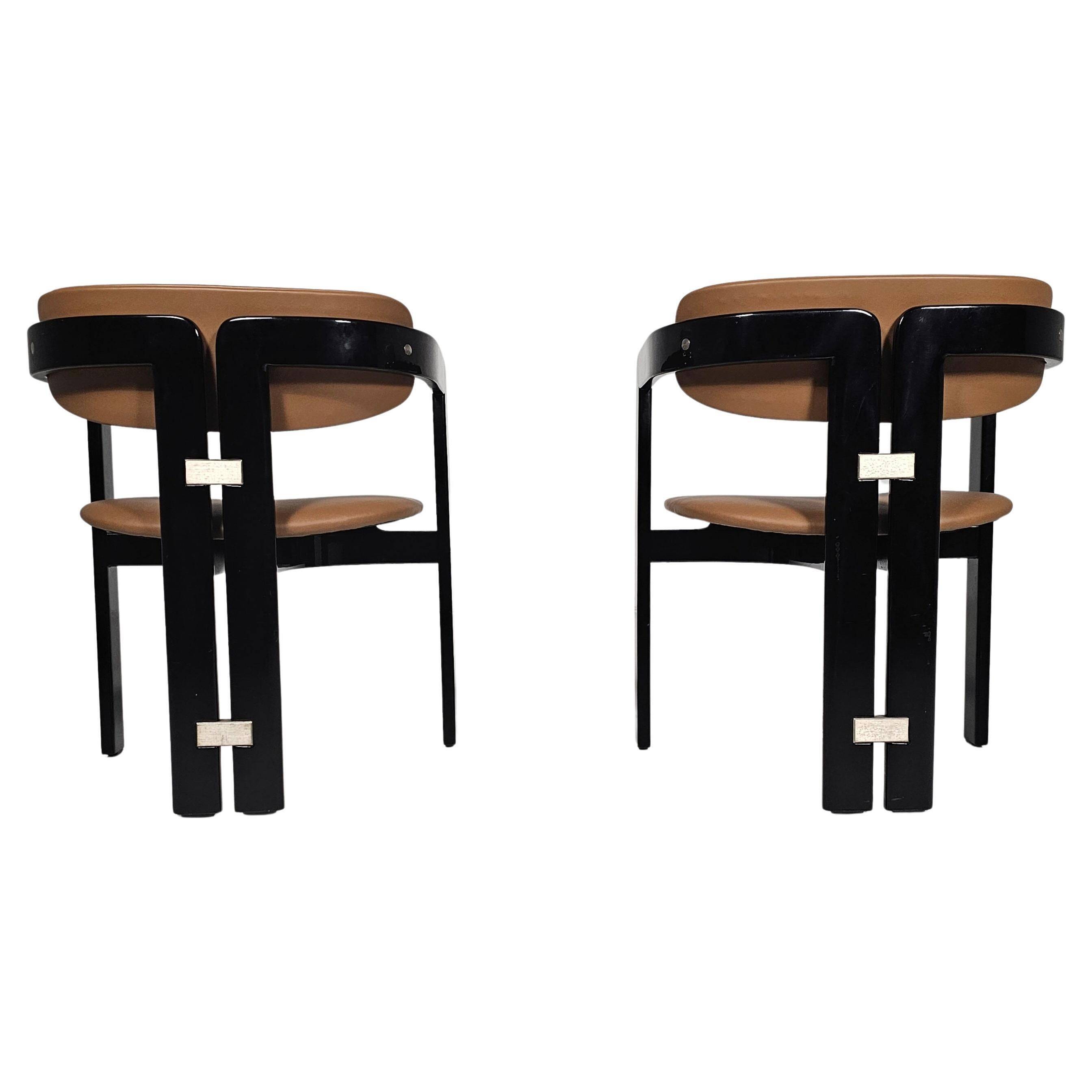 Set of two chairs by Augusto Savini, 1960s.