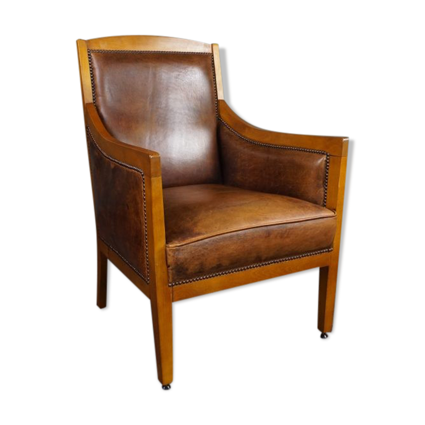 Armchair in sheepskin with beautiful light wood