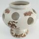 Three Saint-Uze ceramic tealight candle holders, early 20th century