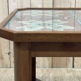 Art Deco side table in mahogany and top covered with a fabric under glass plate