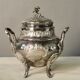 Coffee or tea service monogrammed cr silver metal