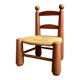 Brutalist low chair in dark wood and straw no. 3