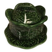 1 small bowl of cabbage with its plate underneath
