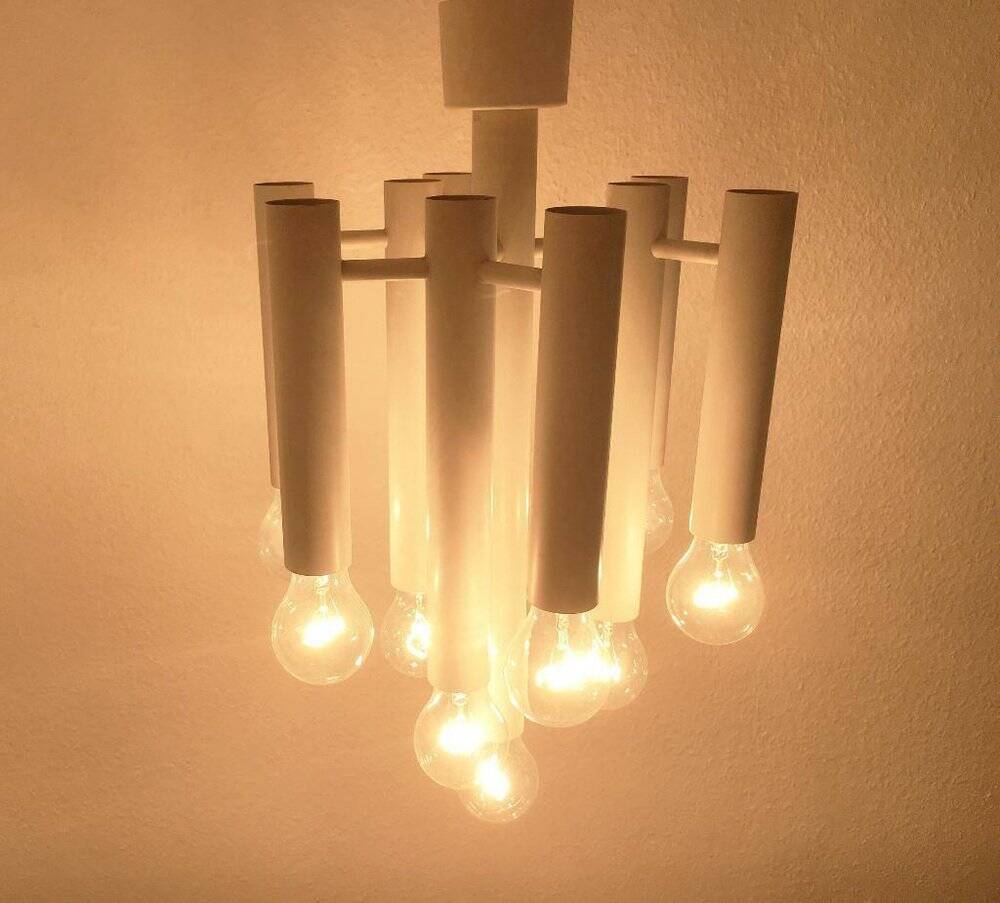 Minimalist suspension from the Swiss space age of the mid-century type 415 by Temde, 1960s.