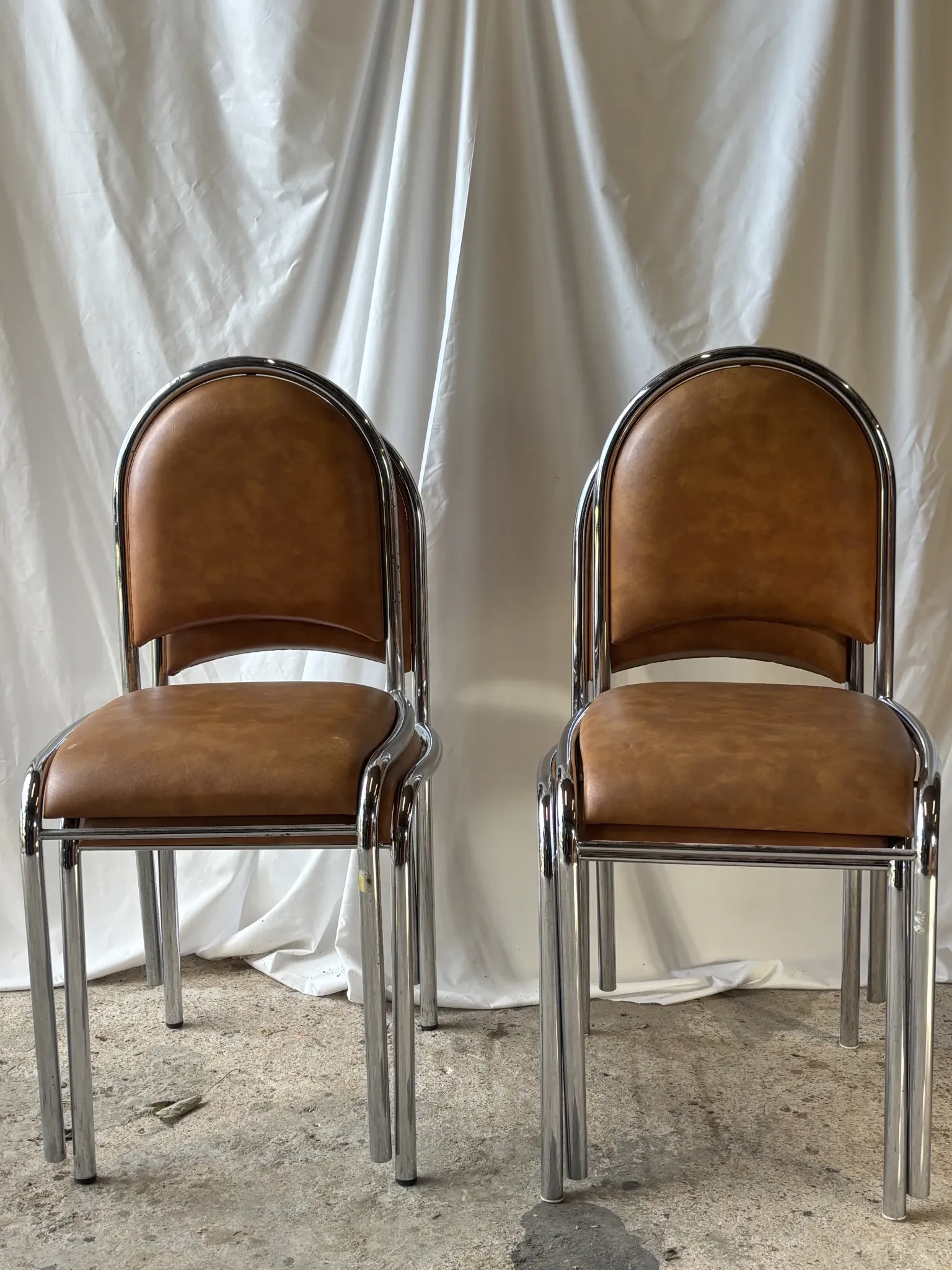 Set of 4 vintage tubular chrome chairs