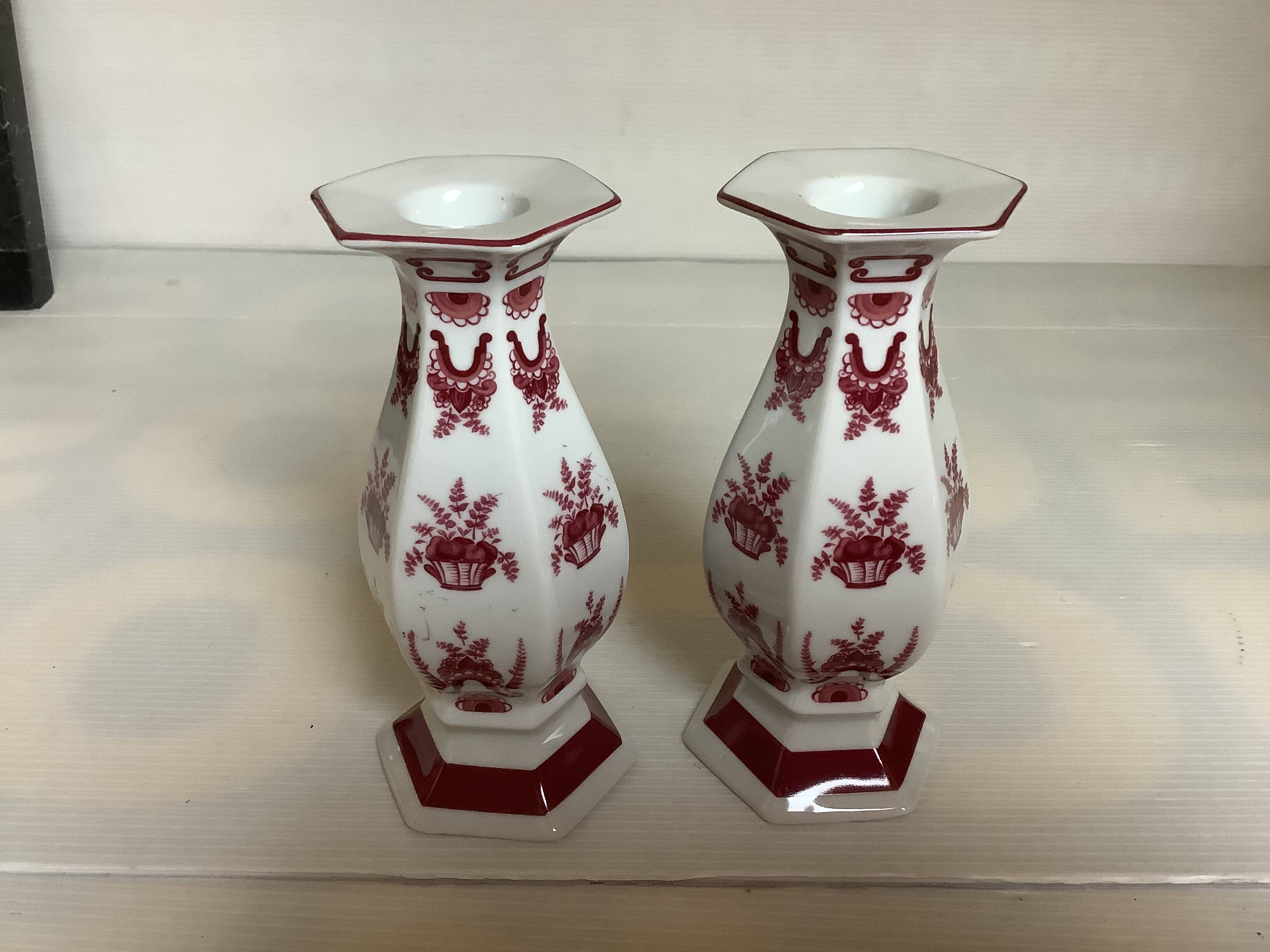 Pair of hexagonal burgundy candlesticks