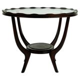 Italian round coffee table from the 1950s with a glass top, attributed to Carlo di Carli.