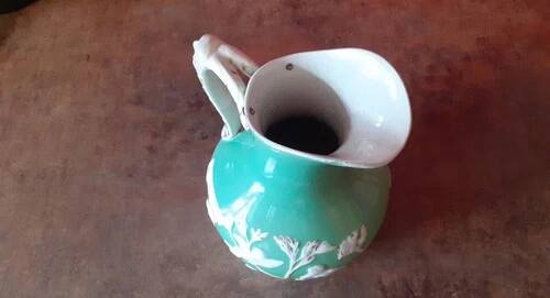 Green ceramic jug
