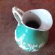 Green ceramic jug
