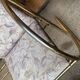 Vintage brass and glass bench, yellow colour, two-seater, tubular design from the 1950s.