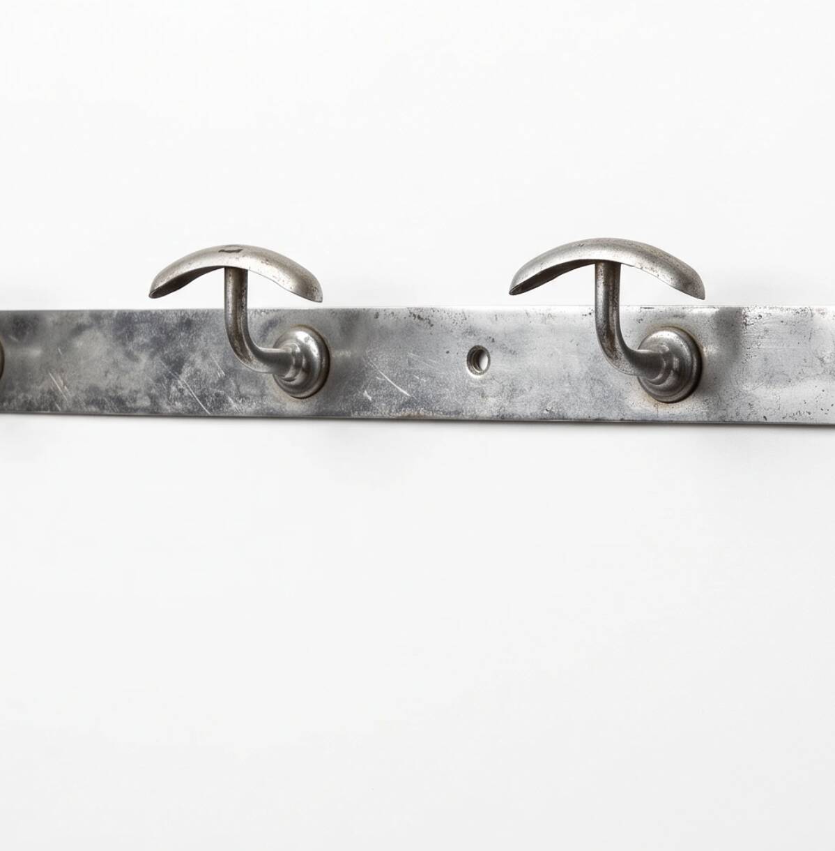 Vintage chrome wall coat rack with 4 hooks, modernist/industrial design.