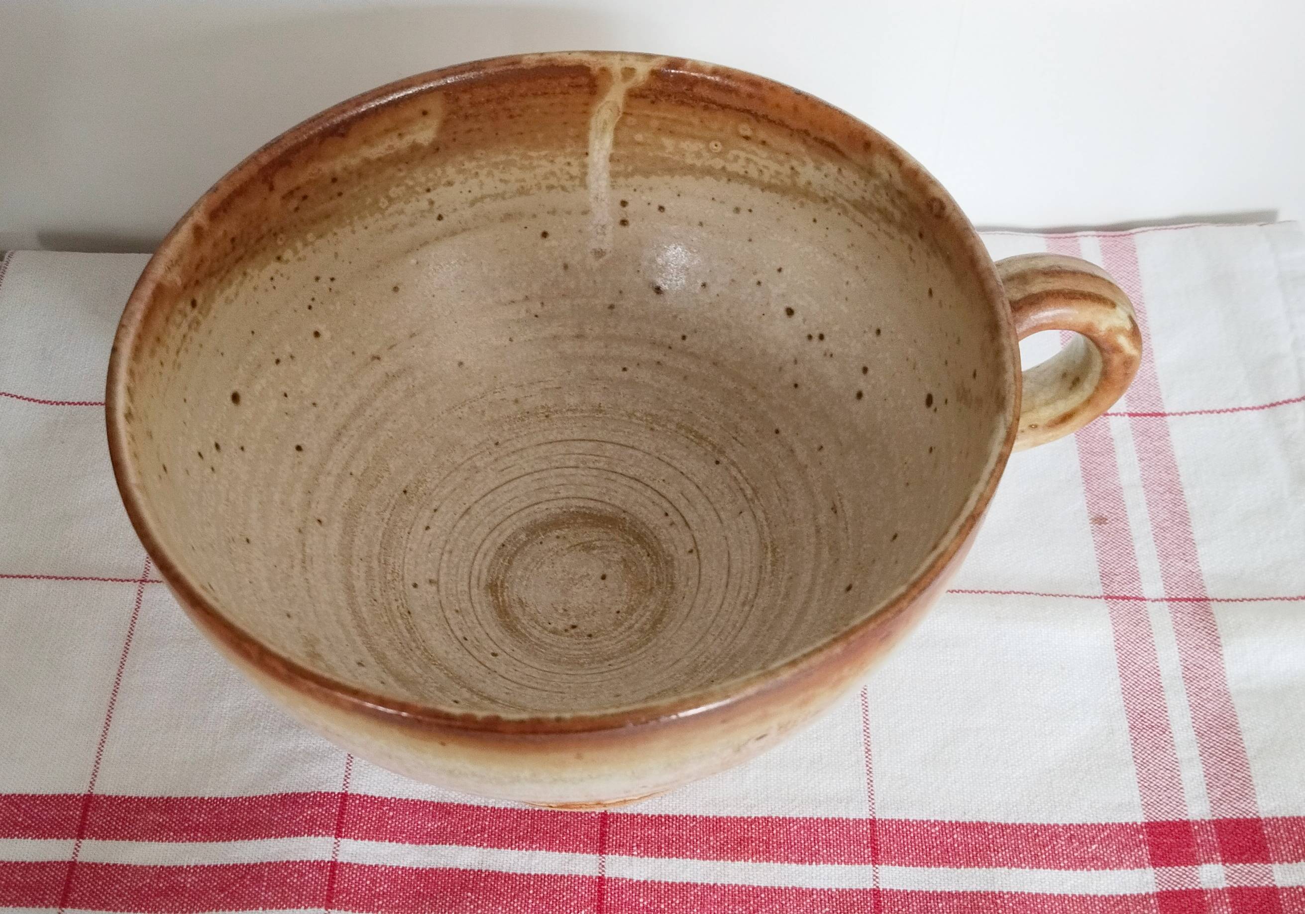 Large handmade stoneware bowl with foot