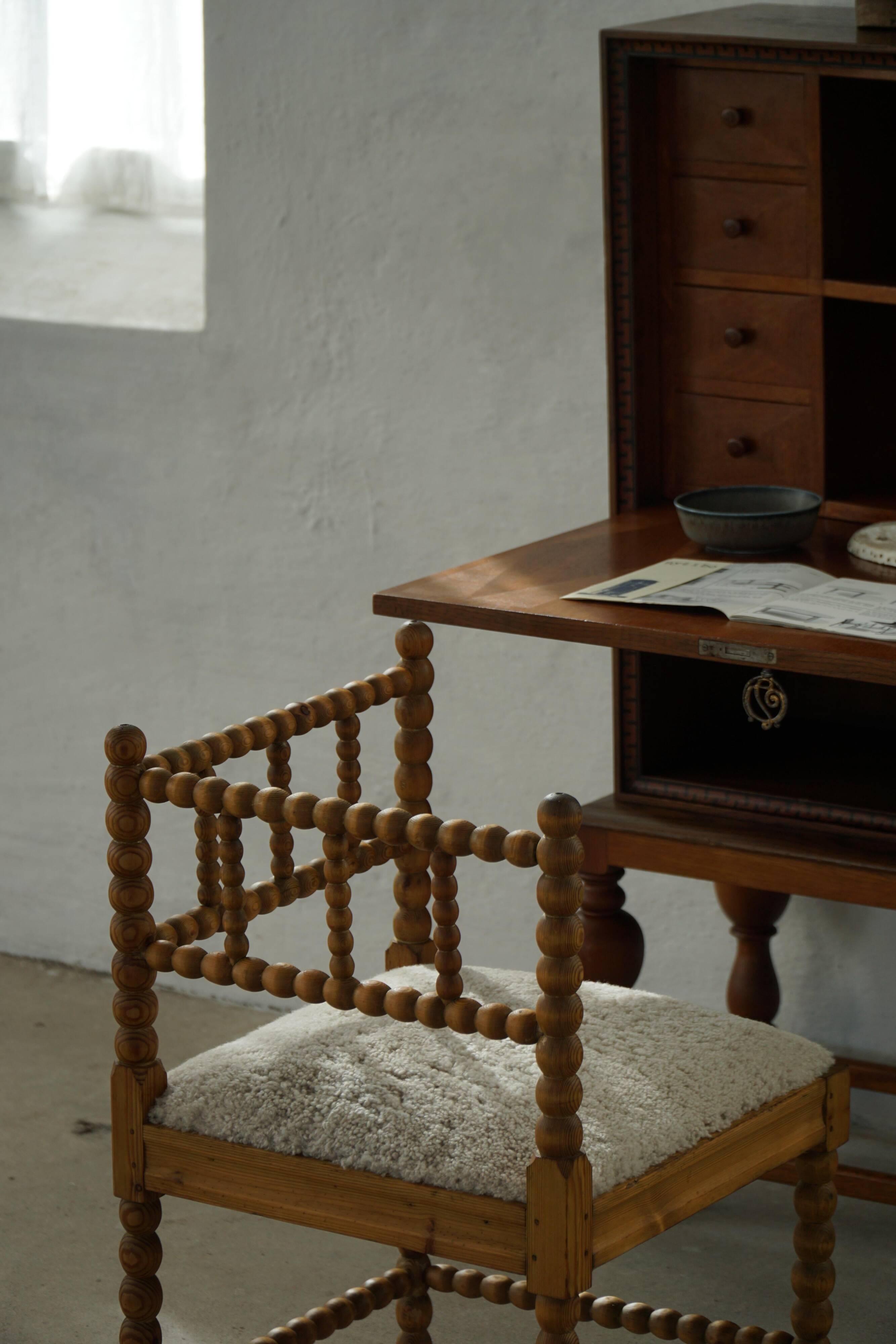 Antique French corner chair handcrafted with lamb's wool, early 20th century.