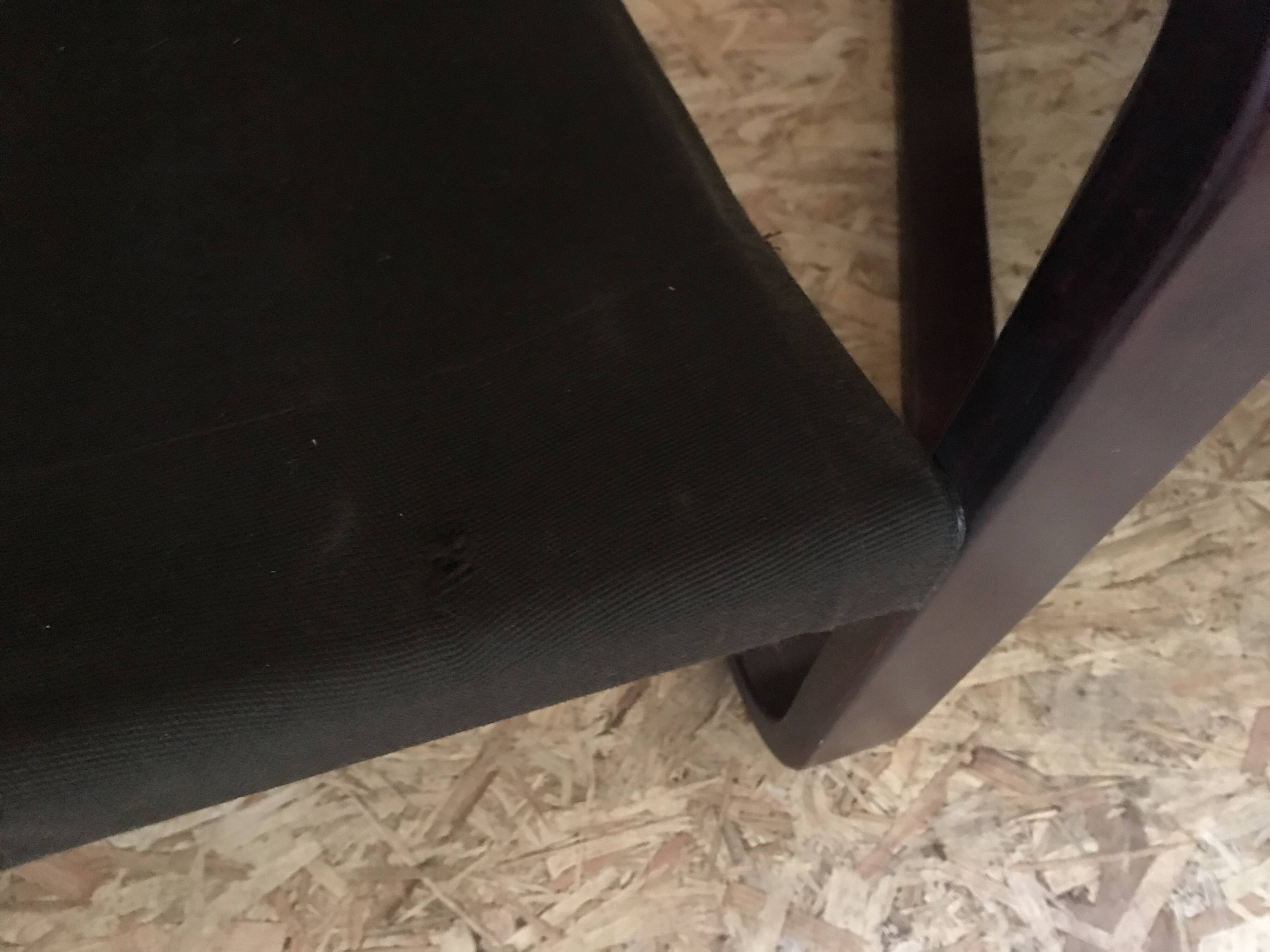 Pair of vintage armchairs in curved wood with suspended seat circa 1970-80.