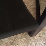 Pair of vintage armchairs in curved wood with suspended seat circa 1970-80.