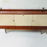Vintage row in lacquered wood and formica