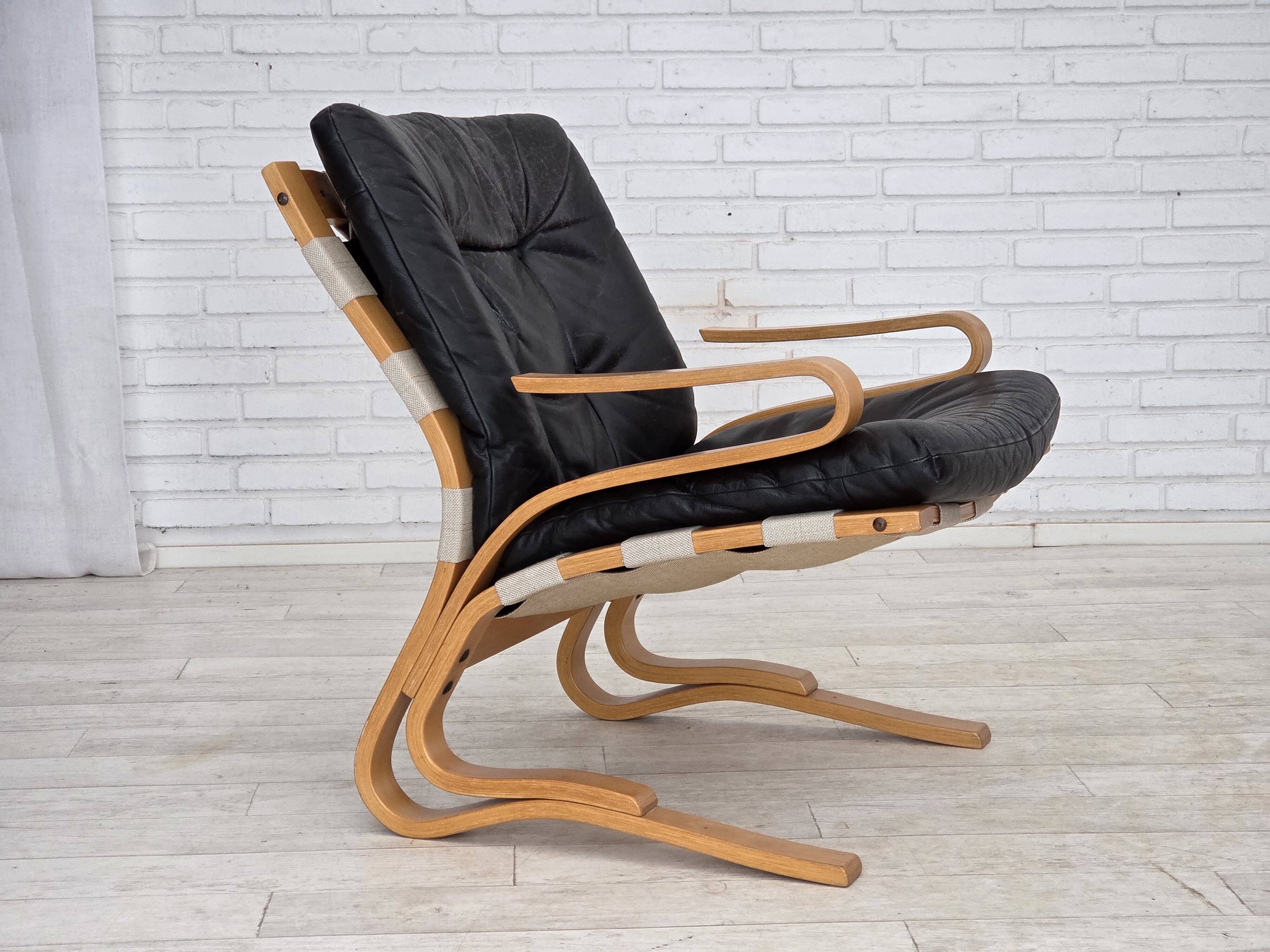 1970s, Norwegian design, armchair model "Kengu", leather, bent wood.