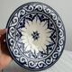 Raised dish, ceramic plate with blue and white patterns.