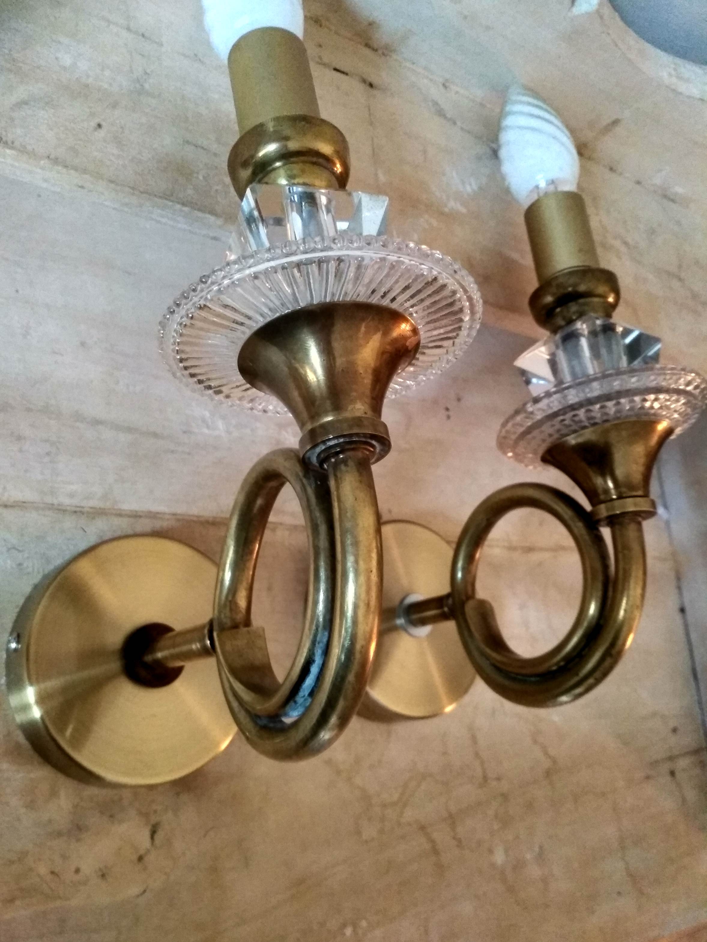 Pair of old brass wall sconces