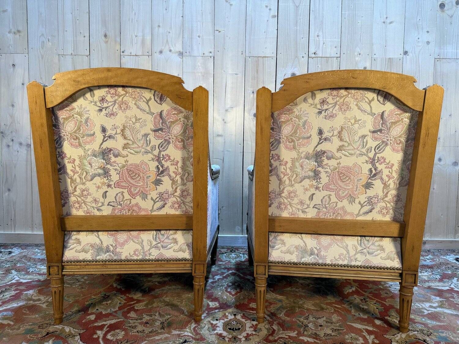 Pair of armchairs / bergères and footstool in Louis XVI style