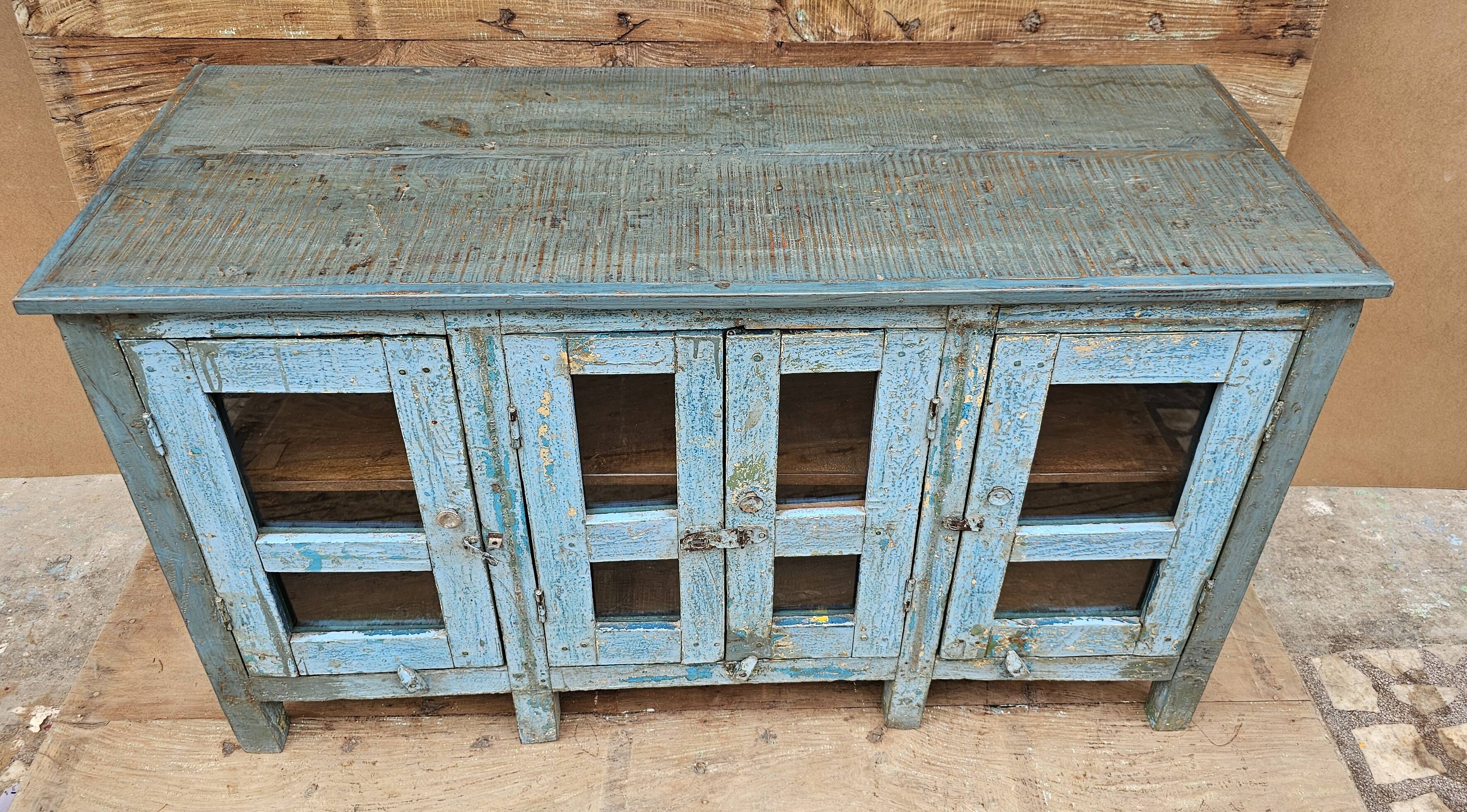 Antique glass-fronted buffet in Burmese teak