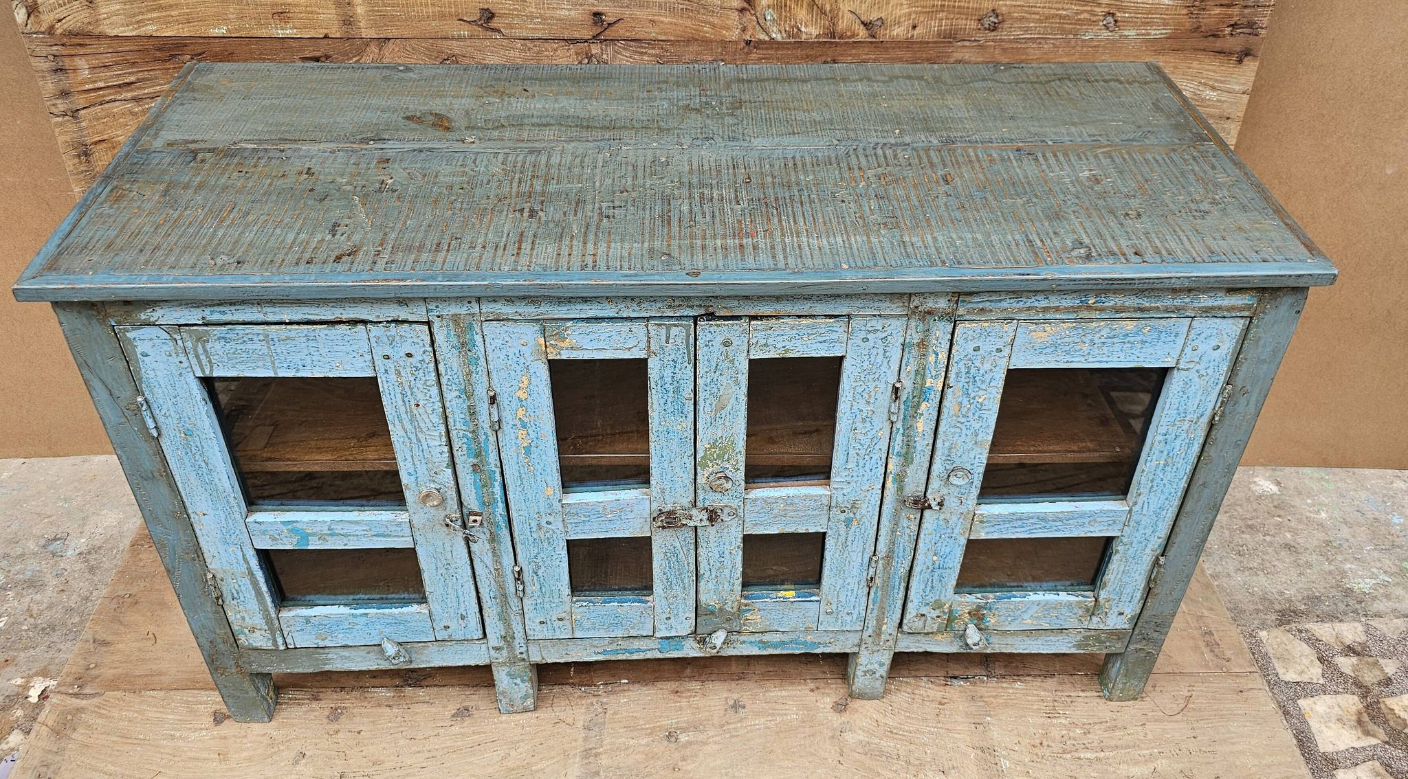 Antique glass-fronted buffet in Burmese teak