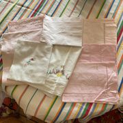 Set of embroidered baby bed sheets