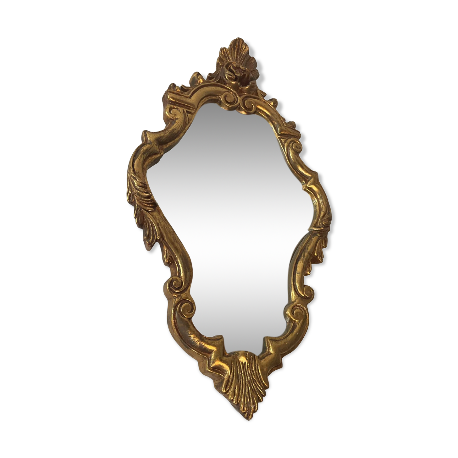 Old italian mirror in gilded plaster with leaf