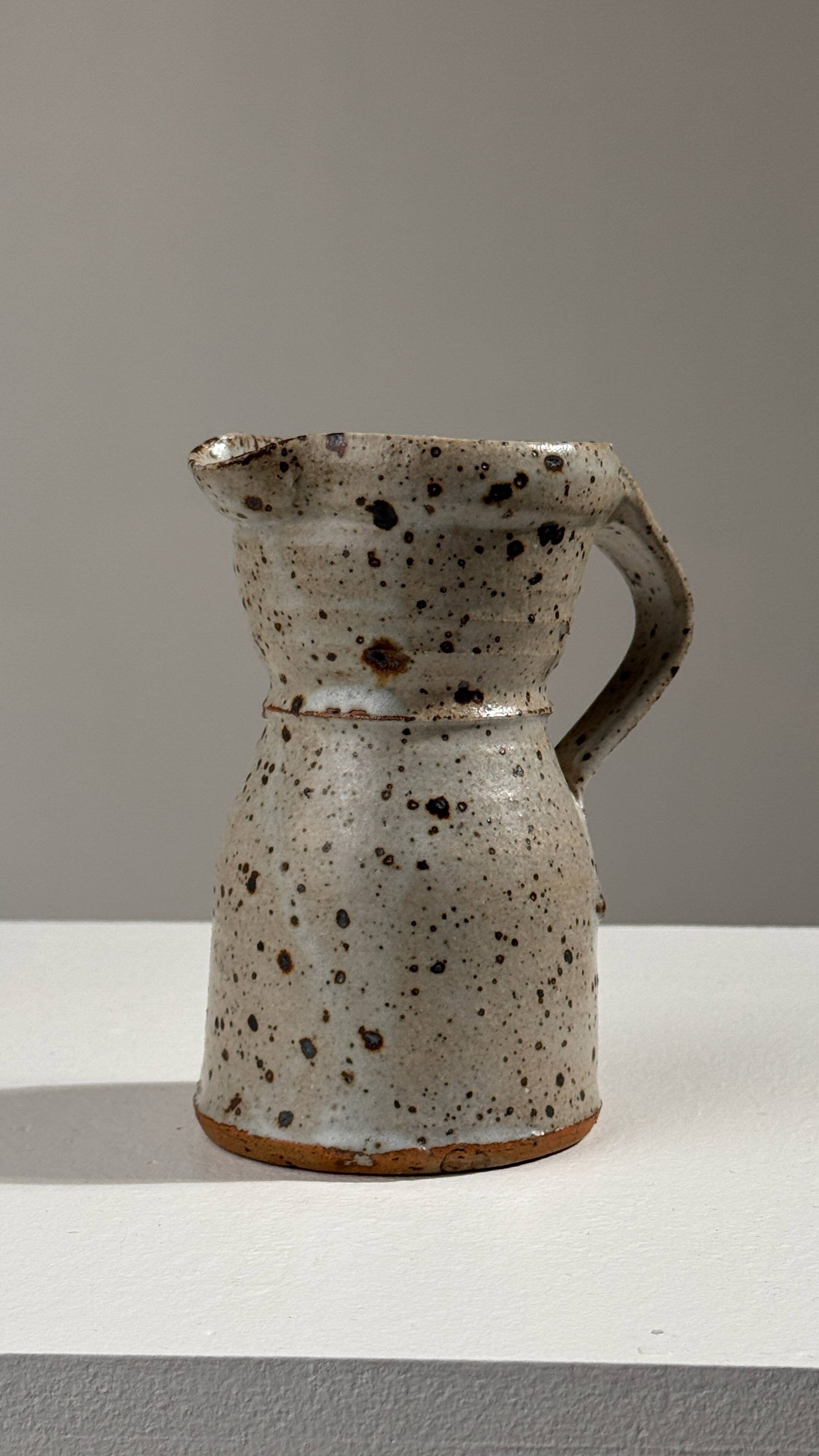 Small stoneware jug by Gustave Tiffoche