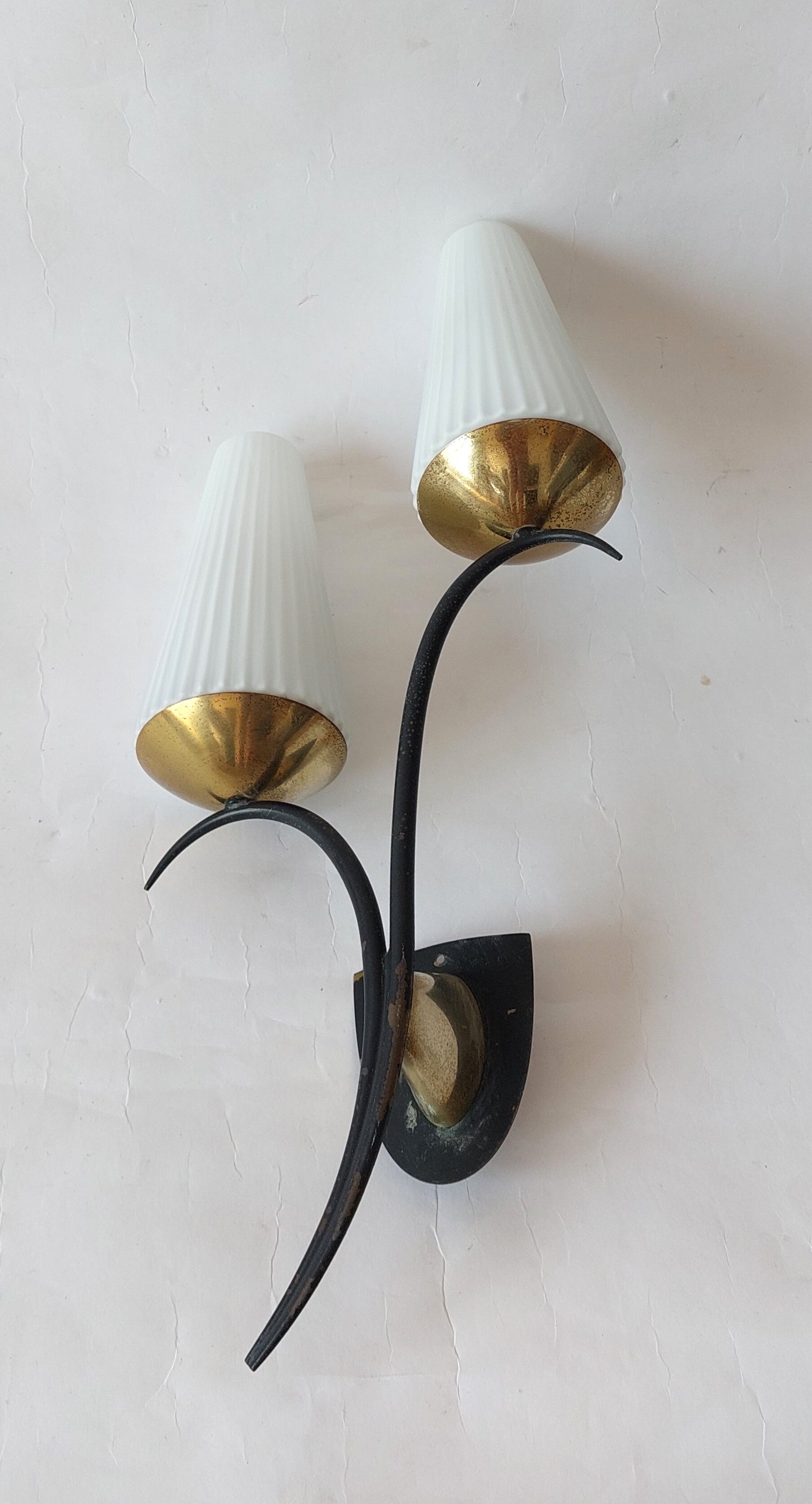 Wall lamp in black metal and gilded brass 1960 with two lights.