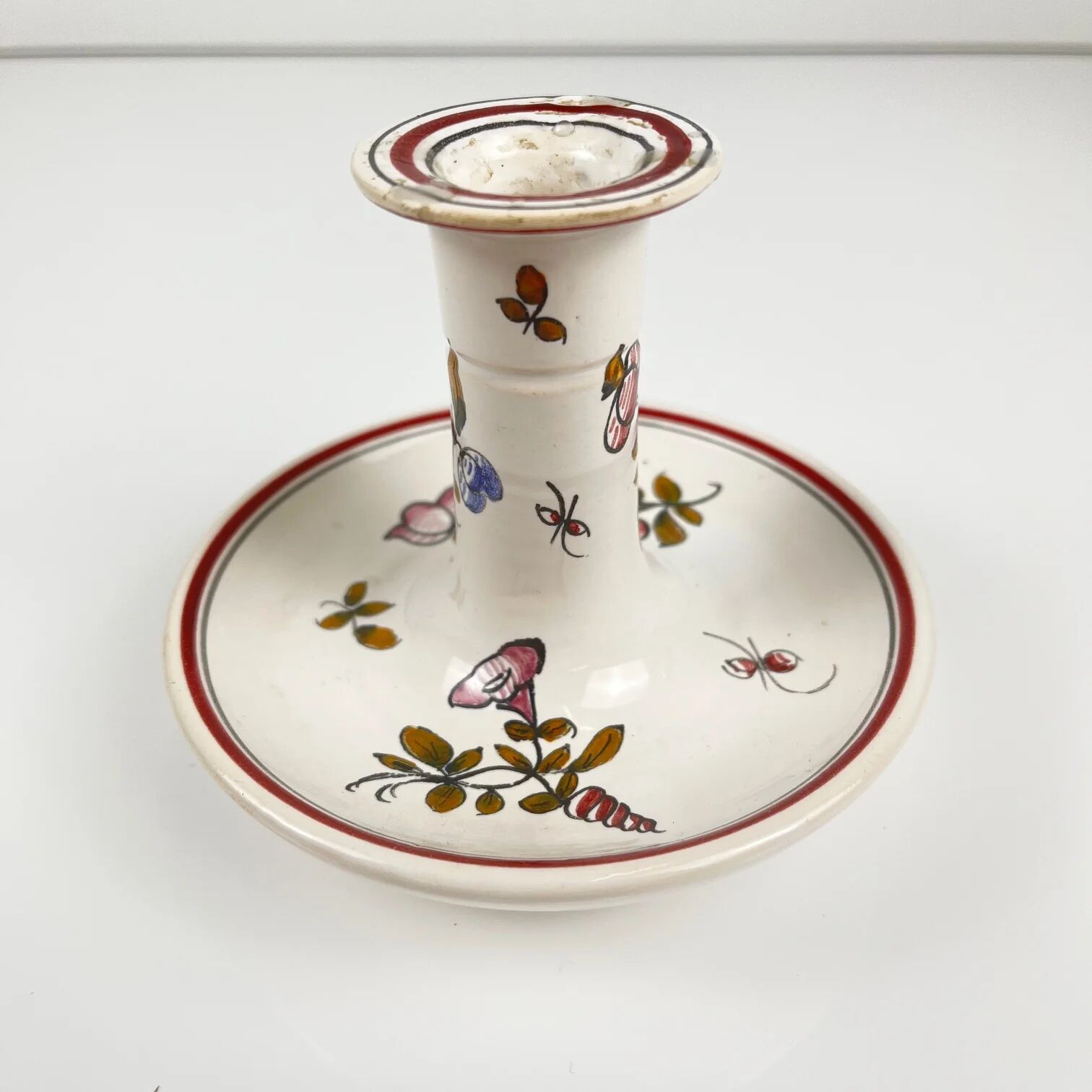 Hand-painted ceramic candlestick, flower pattern.