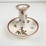Hand-painted ceramic candlestick, flower pattern.